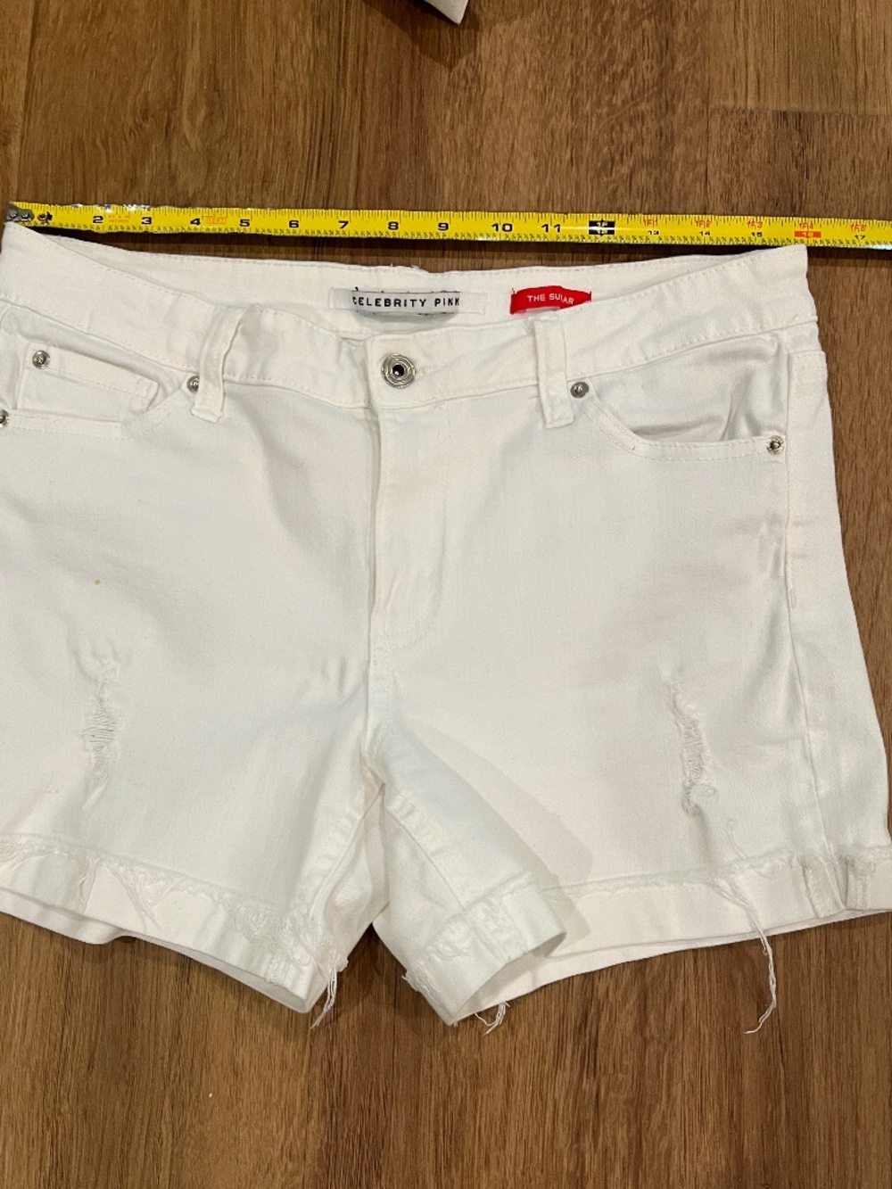 Celebrity pink white shorts slightly distressed size 9
